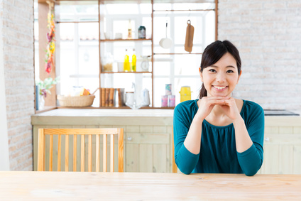 young asian woman in the kitchen